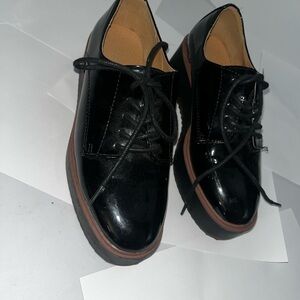 Madden Girl Black and Brown Platform Sneakers with Classic Design